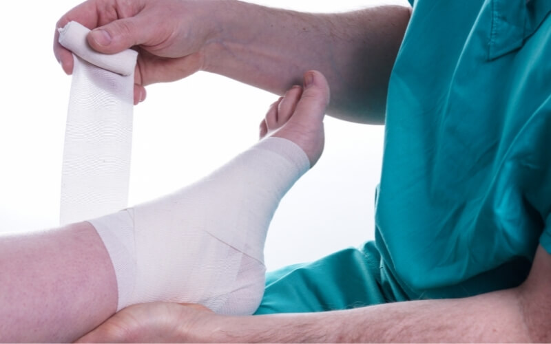 taping ankle to protect for ankle sprain